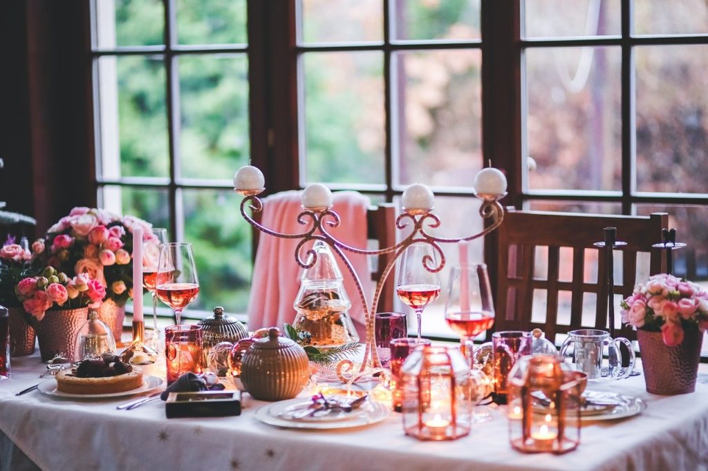 a Christmas themed dining table setting